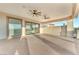 Large outdoor balcony with ceiling fans and sliding door access at 743 N Orleans St, Henderson, NV 89015