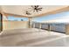 Covered balcony featuring dual ceiling fans and stunning views of the neighborhood at 743 N Orleans St, Henderson, NV 89015