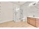 Modern bathroom features stylish vanity, toilet, and glass enclosed walk-in shower at 743 N Orleans St, Henderson, NV 89015