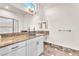 Charming bathroom showcasing marble countertop, bowl sinks, and decorative tile at 743 N Orleans St, Henderson, NV 89015