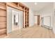 Spacious walk-in closet with built-in shelving and wood floors at 743 N Orleans St, Henderson, NV 89015
