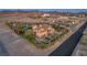 Expansive desert estate with tile roof, lush trees, wrought iron fence and beautiful landscaping at 743 N Orleans St, Henderson, NV 89015