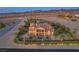 Stunning home with desert landscaping, mature palms and tile roof at 743 N Orleans St, Henderson, NV 89015