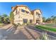 Stunning two-story home featuring a desert landscape, balcony, and stylish architecture at 743 N Orleans St, Henderson, NV 89015
