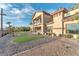 Beautiful two-story home with desert landscaping and a lovely stone and gravel yard at 743 N Orleans St, Henderson, NV 89015