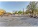 Spacious equestrian area with white fencing and shade structure at 743 N Orleans St, Henderson, NV 89015