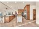 Elegant kitchen with custom wood cabinetry, stone countertops, and stainless steel appliances at 743 N Orleans St, Henderson, NV 89015