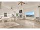 Bright living room with a fireplace, high ceilings, and panoramic views at 743 N Orleans St, Henderson, NV 89015