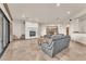 Cozy living room with a decorative fireplace and comfortable seating arrangement at 743 N Orleans St, Henderson, NV 89015