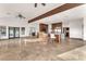 Open living space features tile floors, recessed lighting, and large windows at 743 N Orleans St, Henderson, NV 89015