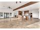 Spacious living room features stone floors, exposed beam, and ample natural light at 743 N Orleans St, Henderson, NV 89015
