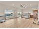 Bright main bedroom with scenic views, wood floors, and access to an en-suite bathroom at 743 N Orleans St, Henderson, NV 89015