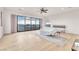 Bright main bedroom with balcony access and hardwood flooring at 743 N Orleans St, Henderson, NV 89015