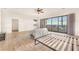 Large main bedroom with hardwood floors and access to a private balcony at 743 N Orleans St, Henderson, NV 89015