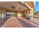 Expansive covered patio features ceiling fans, outdoor kitchen and views at 743 N Orleans St, Henderson, NV 89015