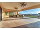 Spacious covered patio with an outdoor kitchen and stunning views of the surrounding landscape at 743 N Orleans St, Henderson, NV 89015