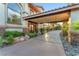 Beautifully appointed home featuring a portico and mature landscaping at 743 N Orleans St, Henderson, NV 89015