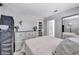 Bedroom with dresser and closet, offering ample storage and space at 818 Grape Vine Ave, Henderson, NV 89002