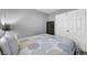 Bedroom with bed, side table, and closet space for a restful night at 818 Grape Vine Ave, Henderson, NV 89002