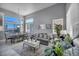Bright living room features stylish decor, modern furniture, and plenty of natural light at 818 Grape Vine Ave, Henderson, NV 89002