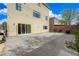 Large backyard featuring stone patio and two story home at 8565 Silver Coast St, Las Vegas, NV 89139