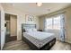 Bedroom with neutral walls, an open door and a window view at 8565 Silver Coast St, Las Vegas, NV 89139