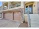 Charming home with brick accents, a balcony, and a three-car garage at 8565 Silver Coast St, Las Vegas, NV 89139