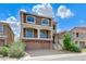 Beautiful two-story home with stone accents, balcony, and three-car garage at 8565 Silver Coast St, Las Vegas, NV 89139