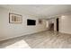 Living room showcasing wood floors, recessed lighting, and modern wall decor at 8565 Silver Coast St, Las Vegas, NV 89139