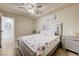 Relaxing main bedroom features ceiling fan, wood floors, and stylish decor at 8565 Silver Coast St, Las Vegas, NV 89139