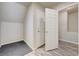 Storage room with neutral walls, wood-look flooring, and built in shelving at 8565 Silver Coast St, Las Vegas, NV 89139