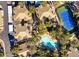 Aerial community view showcasing a blue tennis court, pool, and lush landscaping at 9000 Las Vegas Blvd # 1142, Las Vegas, NV 89123
