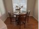 Cozy dining area features wood-look flooring, a modern light fixture, and room for four at 9000 Las Vegas Blvd # 1142, Las Vegas, NV 89123