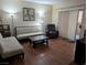 Inviting living room with laminate flooring, neutral paint, and sliding glass doors at 9000 Las Vegas Blvd # 1142, Las Vegas, NV 89123
