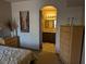 A relaxing main bedroom with art and decor is shown adjacent to a main bathroom at 9000 Las Vegas Blvd # 1142, Las Vegas, NV 89123
