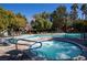 Community pool features a heated spa, ample seating and mature shade trees at 9000 Las Vegas Blvd # 1142, Las Vegas, NV 89123