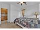 Bedroom featuring a standard bed, carpet flooring, and closet at 9614 Stonily Ln, Las Vegas, NV 89178