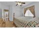 Bedroom with a four-poster bed, a closet, and neutral colored carpet at 9614 Stonily Ln, Las Vegas, NV 89178