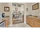 Dining room with hardwood floors, chandelier, and view of formal living area at 9614 Stonily Ln, Las Vegas, NV 89178