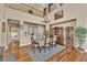 Dining room with hardwood floors, chandelier, and an open concept design at 9614 Stonily Ln, Las Vegas, NV 89178