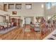 Spacious living room with hardwood floors, high ceilings, and open concept design at 9614 Stonily Ln, Las Vegas, NV 89178