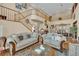 Spacious living room featuring high ceilings, staircase, and view into the dining room at 9614 Stonily Ln, Las Vegas, NV 89178