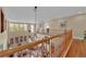 Upper level of a home featuring spacious living area and windows for natural light at 9614 Stonily Ln, Las Vegas, NV 89178