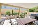 Inviting covered patio area with ample seating and a BBQ grill for outdoor dining and entertaining at 9729 Hawk Crest St, Las Vegas, NV 89141