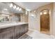 Beautiful bathroom with dual sinks and a walk-in shower at 9729 Hawk Crest St, Las Vegas, NV 89141