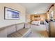 Spacious bedroom with sitting area, neutral walls, carpet, and modern decor at 9729 Hawk Crest St, Las Vegas, NV 89141