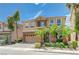 Gorgeous two-story home featuring a well-maintained lawn and a two-car garage at 9729 Hawk Crest St, Las Vegas, NV 89141