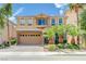 Stunning two-story home featuring a well-maintained lawn and a two-car garage at 9729 Hawk Crest St, Las Vegas, NV 89141