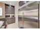 Gourmet kitchen featuring stainless steel appliances and plenty of custom cabinet space at 9729 Hawk Crest St, Las Vegas, NV 89141