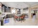 Spacious kitchen featuring an island with barstool seating and stainless steel refrigerator at 9729 Hawk Crest St, Las Vegas, NV 89141